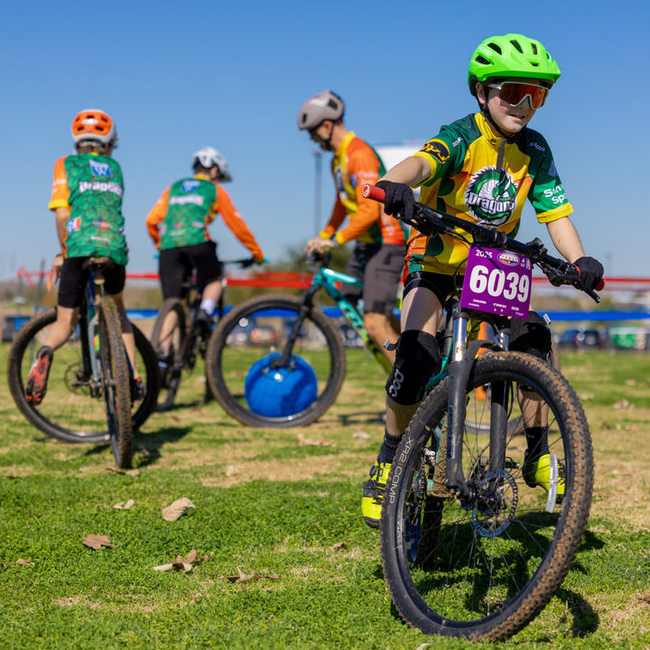 Students from the Green Dragos NICA team playing bike soccer